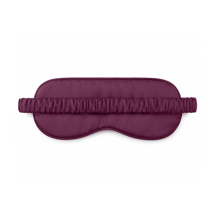 Burgundy silk sleep mask, flat lay