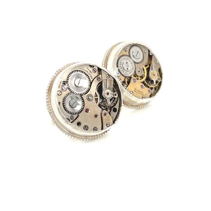 Sterling silver cuff links with mechanical detail handcrafted  in Boston on a white background right angle view.