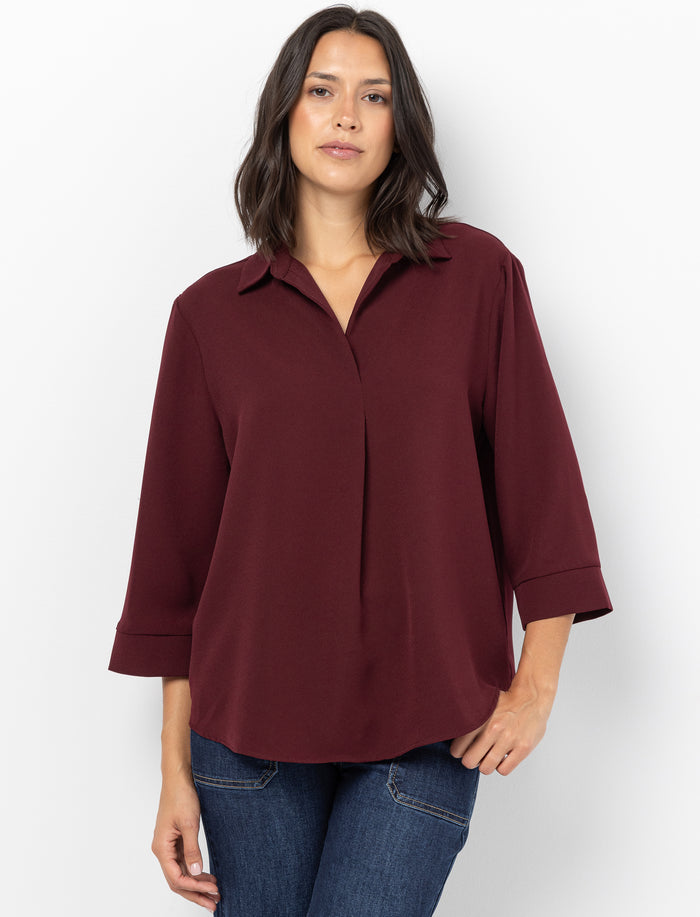 Blouse unie à manches 3/4
