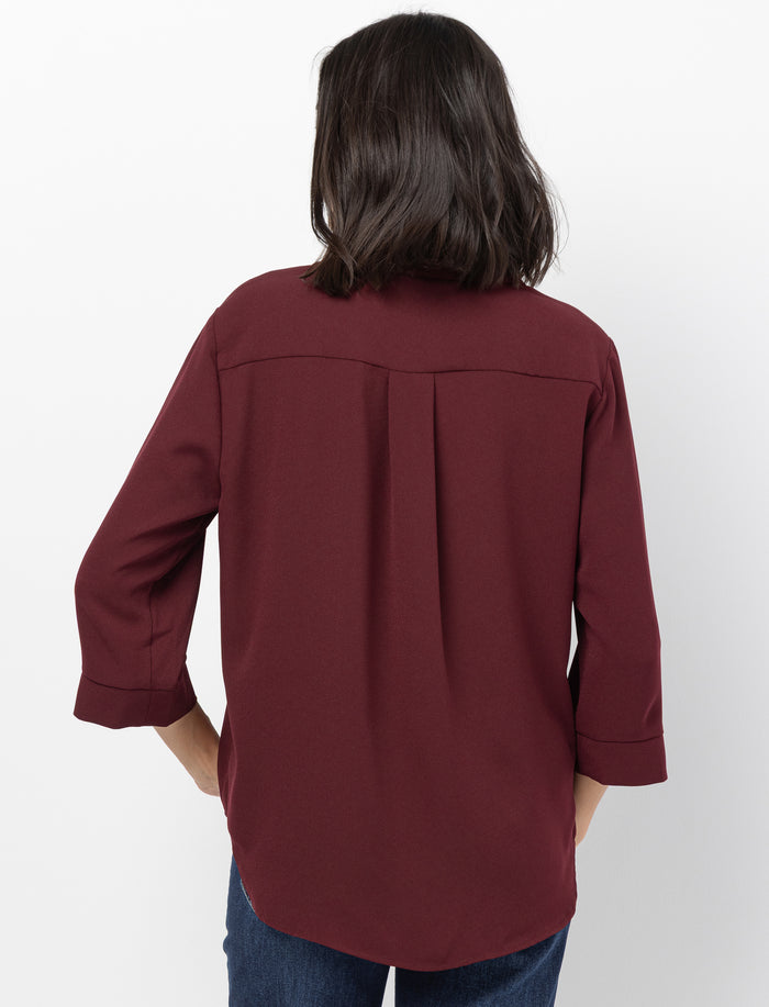 Blouse unie à manches 3/4