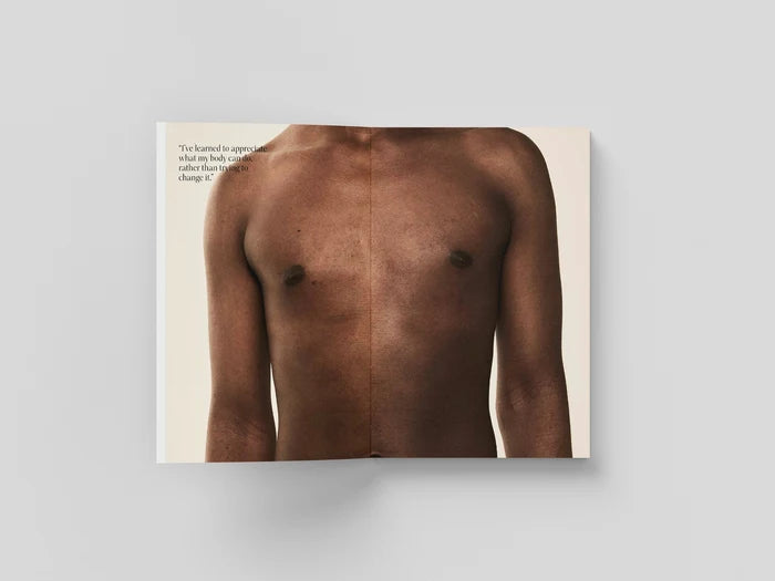 The Chests book open to a full-bleed portrait of a bare chest