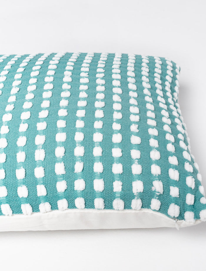 Coussin à point texturé