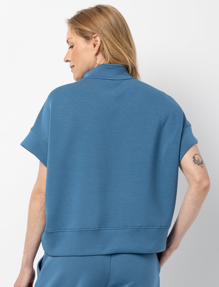 Haut en scuba à demi-zip pour femme