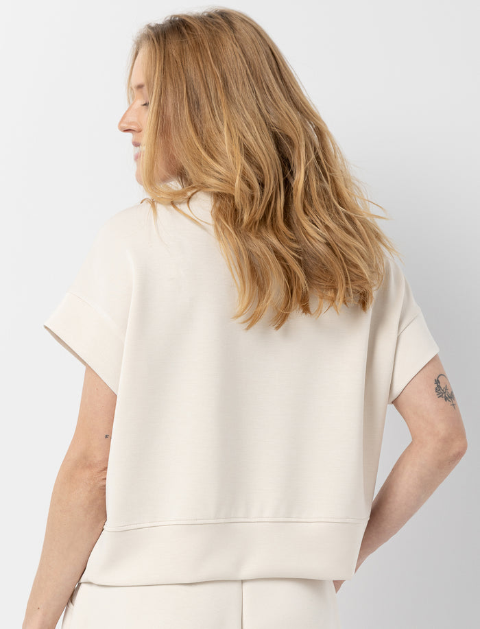 Haut en scuba à demi-zip pour femme