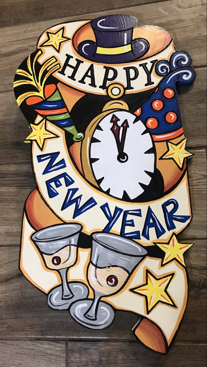 A festive hand-painted wooden yard decoration featuring a "Happy New Year" banner draped over a large pocket watch showing midnight. The design is decorated with a top hat, party hats, golden stars, and two champagne glasses, displayed against a dark wood background.