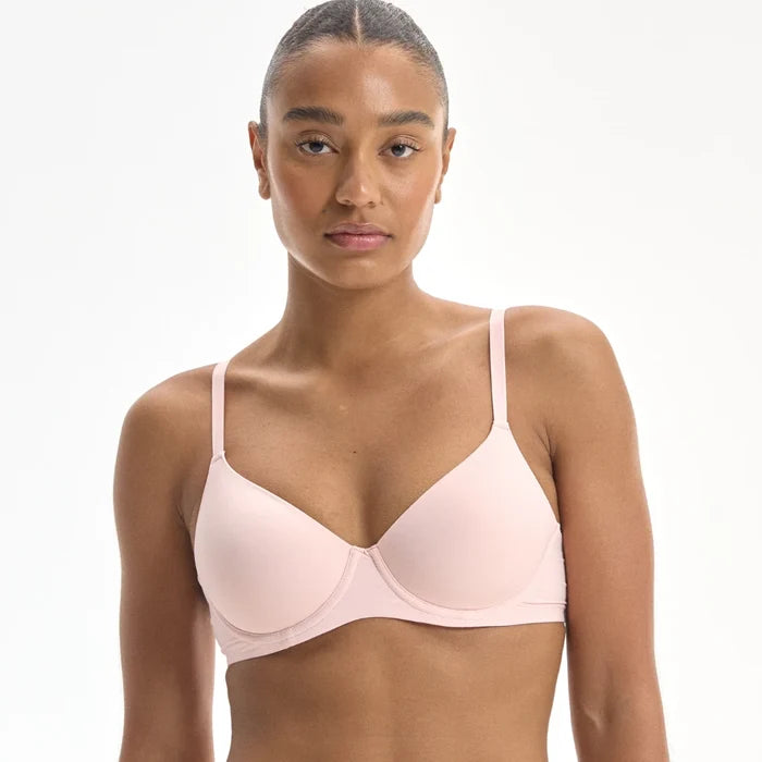 Model wearing the Padded Flexiwire Bra in pale pink, front view