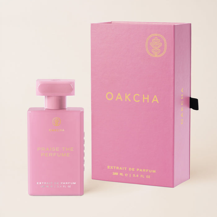 Praise the Perfume Extrait de Parfum bottle next to its box