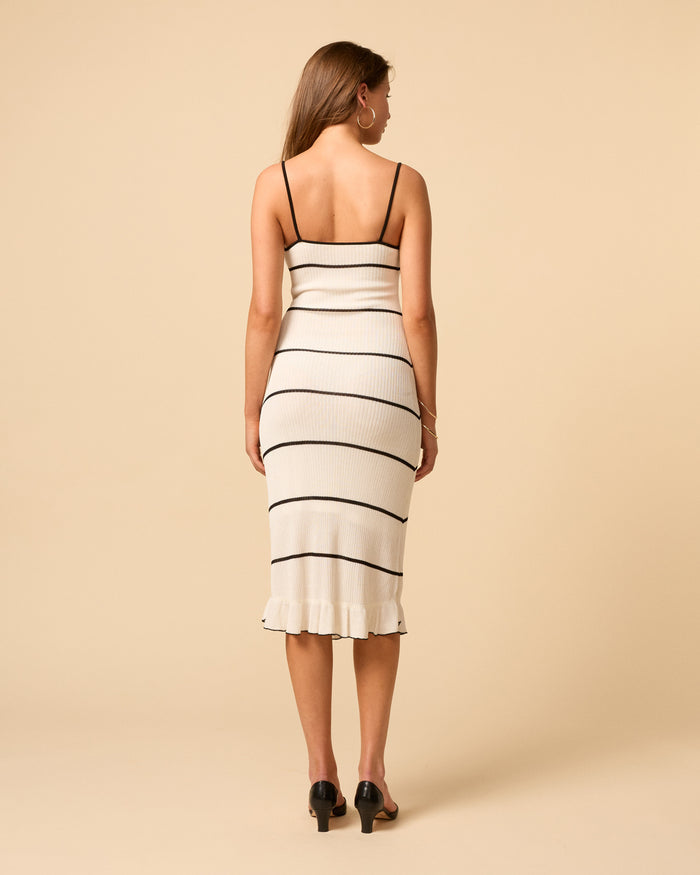 Black and white stripe knit midi dress with sweetheart neckline and lettuce hem