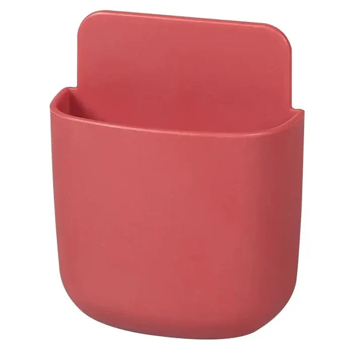 A red plastic cup holder