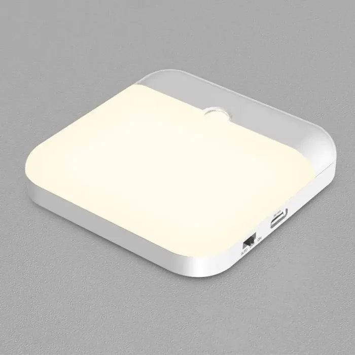 A white light on a gray surface