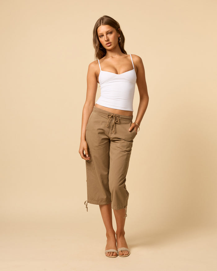 Women's white singlet with sweetheart neckline and countoured waist